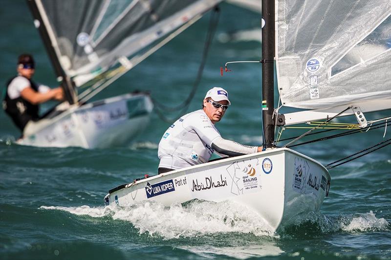 Slovenia's Vasilij Zbogar on day 1 of the ISAF Sailing World Cup Final in Abu Dhabi photo copyright Pedro Martinez / Sailing Energy / ISAF taken at  and featuring the Finn class