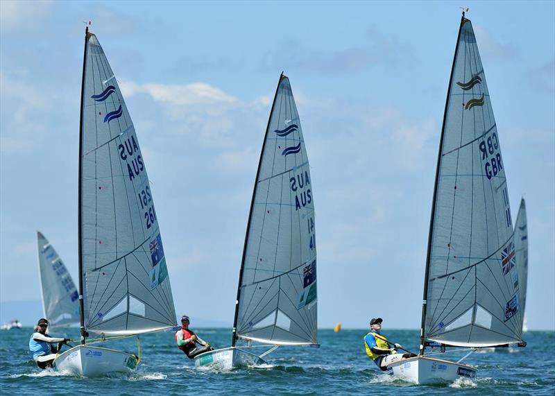 Victorian sailor Oli Tweddell (AUS) and Queensland's Jake Lilley (AST) are throwing everything they have at Ed Wright in the Finn class on day 5 of the ISAF Sailing World Cup Melbourne photo copyright Jeff Crow / Sport the Library taken at Sandringham Yacht Club and featuring the Finn class