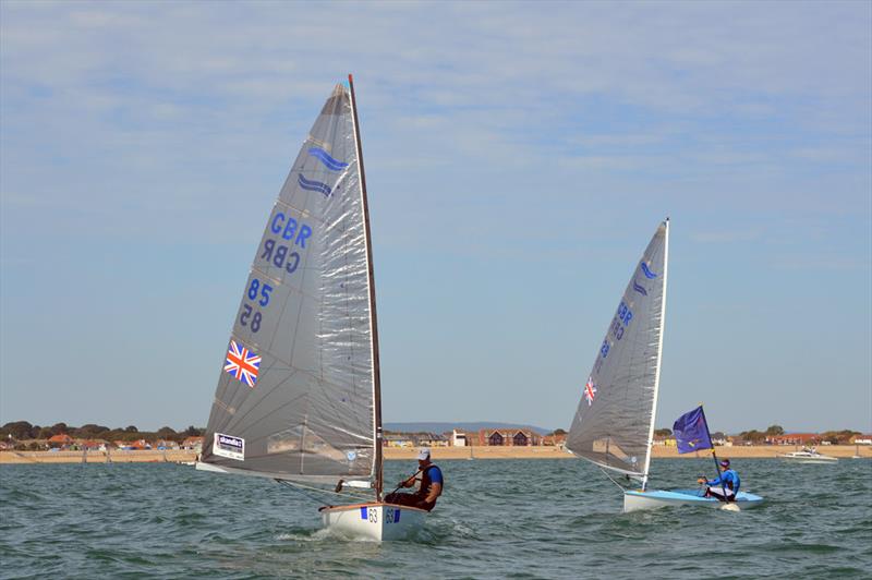 Andrew Mills leads Jack Arnell on day 1 of the British Open Finn Nationals at Hayling Island photo copyright Richard Beasley taken at Hayling Island Sailing Club and featuring the Finn class