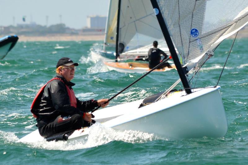 Tim Tavinor on day 2 of the British Open Finn Nationals at Hayling Island photo copyright Richard Beasley taken at Hayling Island Sailing Club and featuring the Finn class