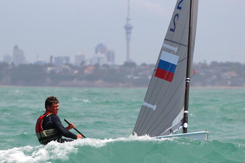 Oleksiy Borysov (top Russian) on day 4 of the Finn Gold Cup in New Zealand photo copyright Robert Deaves taken at Takapuna Boating Club and featuring the Finn class