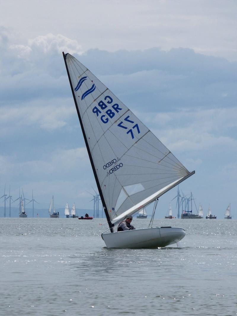 Stewart Mitchell, overall fast handicap class winner, ghosting along in light airs in his Finn during Solway YC Kippford Week photo copyright Becky Davison taken at Solway Yacht Club and featuring the Finn class