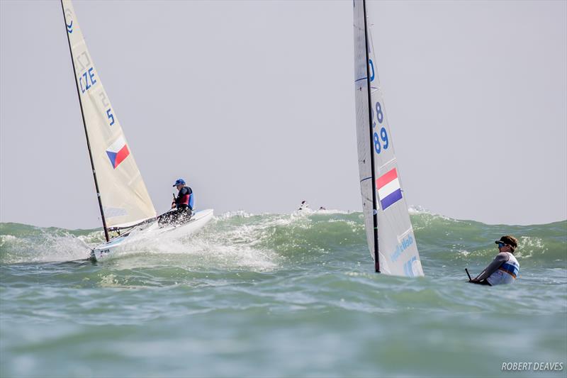 Nicholas Heiner leads Ondrej Teply through some big chop on day 1 of the Finn Europeans in Cádiz, Spain photo copyright Robert Deaves taken at  and featuring the Finn class