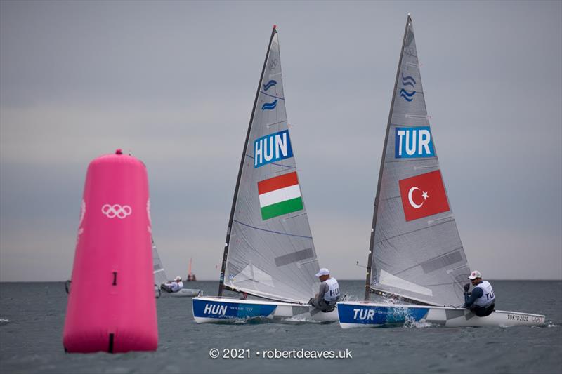 Kaynar leads Berecz on the first day of Finn class racing at the Tokyo 2020 Olympic Sailing Competition photo copyright Robert Deaves / www.robertdeaves.uk taken at  and featuring the Finn class