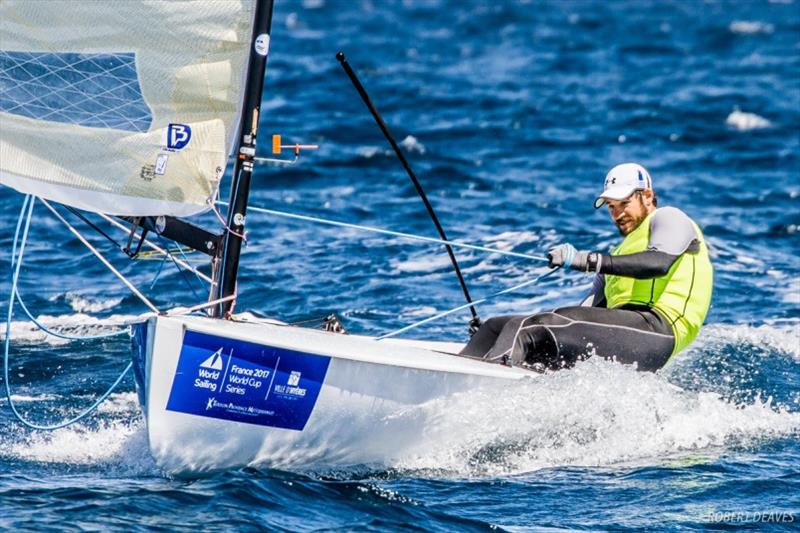 Alican Kaynar, from Turkey, sailed at the Olympics in 2012 and 2016 and is campaigning for Tokyo 2020. Pictured during the World Cup Series in Hyeres in 2017, which he won photo copyright Robert Deaves taken at  and featuring the Finn class