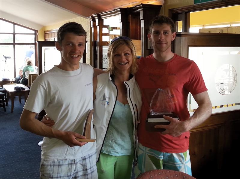 Fireball Munster Champions, Barry McCartin and Conor Kinsella flank Class Chairwoman, Marie Barry photo copyright Cormac Bradley taken at Wexford Harbour Boat and Tennis Club and featuring the Fireball class