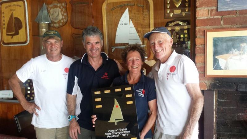 Ian Lane, Chris Payne, Heather Macfarlane and Mike Rogers show the Victorian Fireball perpetual trophy photo copyright Bradley Ginnivan taken at Cairn Curran Sailing Club and featuring the Fireball class