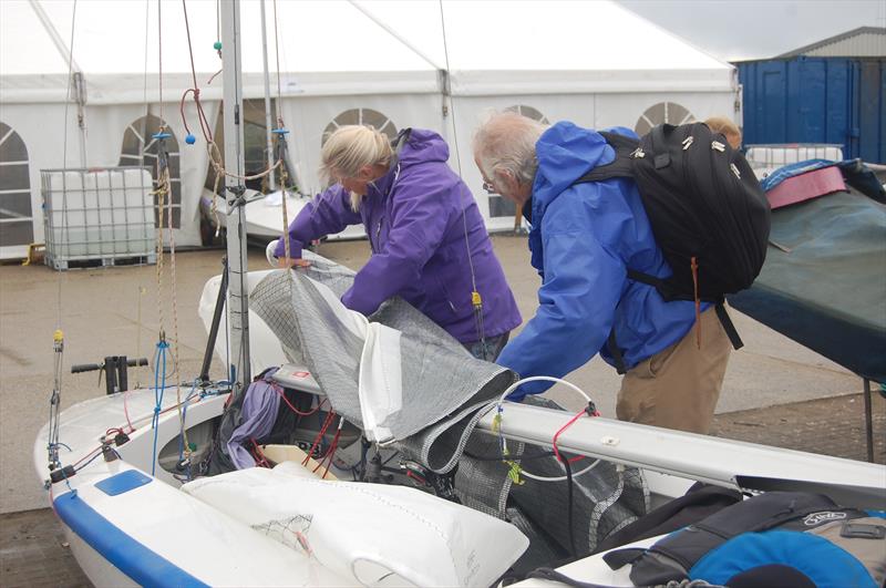 The Measurement Team conducting spot checks as day 4 starts at the Gul UK Fireball Nationals photo copyright David Henshall taken at Plas Heli Welsh National Sailing Academy and featuring the Fireball class