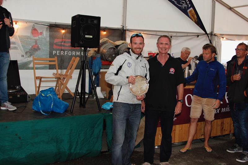 Day 1 prize giving in the Gul Fireball Europeans & Nationals at Lyme Regis photo copyright Aga Robinson taken at Lyme Regis Sailing Club and featuring the Fireball class