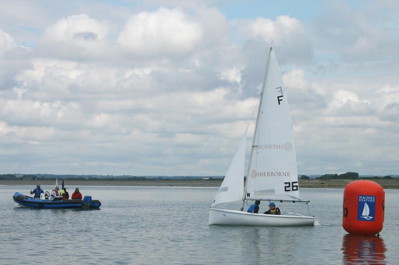 Ben Childerley and Ollie Croft win the final race in the Fireflys at the Itchenor Schools Championships photo copyright Jessica Marsh taken at Itchenor Sailing Club and featuring the Firefly class