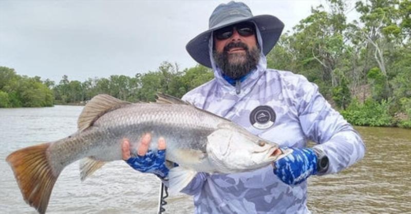 The weather forced the boys from King Linger Fishing Adventures to seek sheltered waters. This barra was a worthy capture on a windy day - photo © Fisho's Tackle World