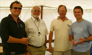 (L-R) Winning crew Chris Turner, commodore Roy Hulse, vice commodore John Robinson, winning helm Graham Vials