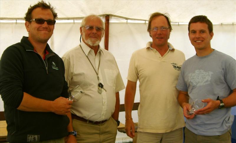 (L-R) Winning crew Chris Turner, commodore Roy Hulse, vice commodore John Robinson, winning helm Graham Vials photo copyright Sue Giles taken at Ullswater Yacht Club and featuring the Flying Fifteen class