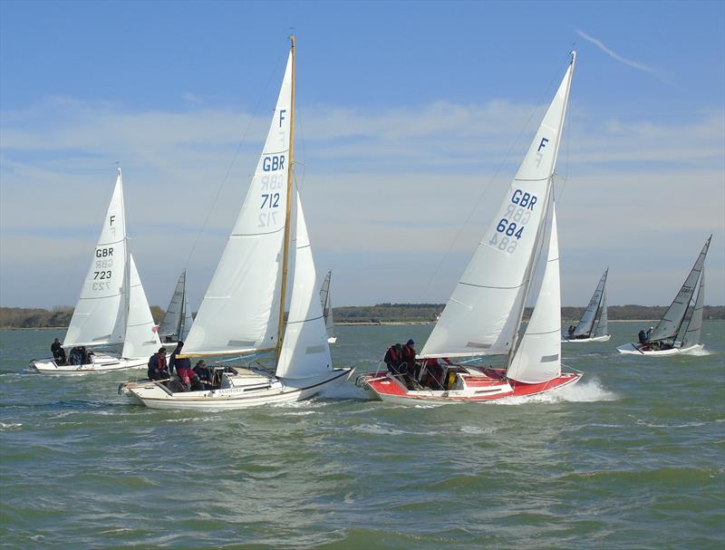 Folkboats during the Portmore Insurance Spring Series photo copyright Ann Brunskill taken at Royal Lymington Yacht Club and featuring the Folkboat class