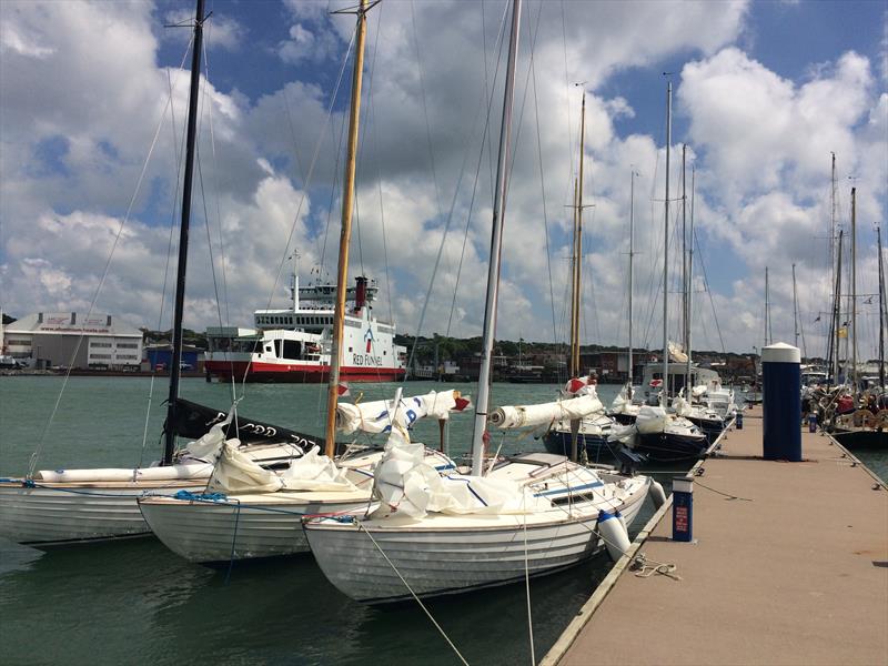 The RLymYC Nordic Folkboat fleet moored up in Cowes photo copyright Chris Baldwick taken at Royal Lymington Yacht Club and featuring the Folkboat class