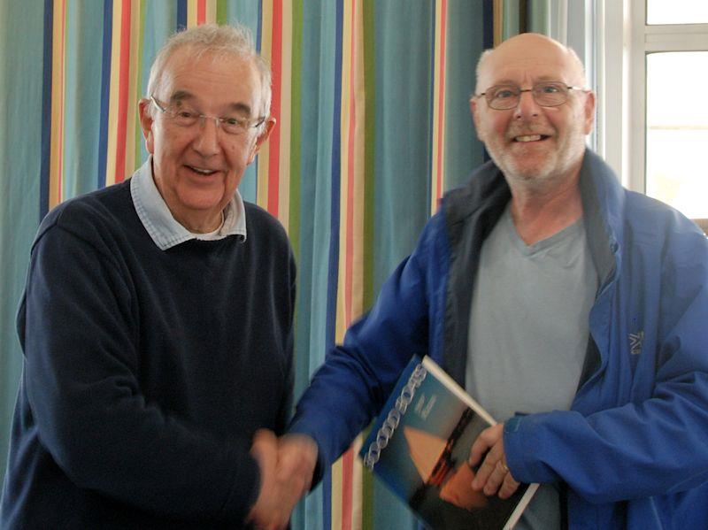 Peter Mitchell (L) and Peter Shepherd receiving his prize - Footy class Videlo Globe at Frensham Pond photo copyright Roger Stollery taken at Frensham Pond Sailing Club and featuring the Footy class