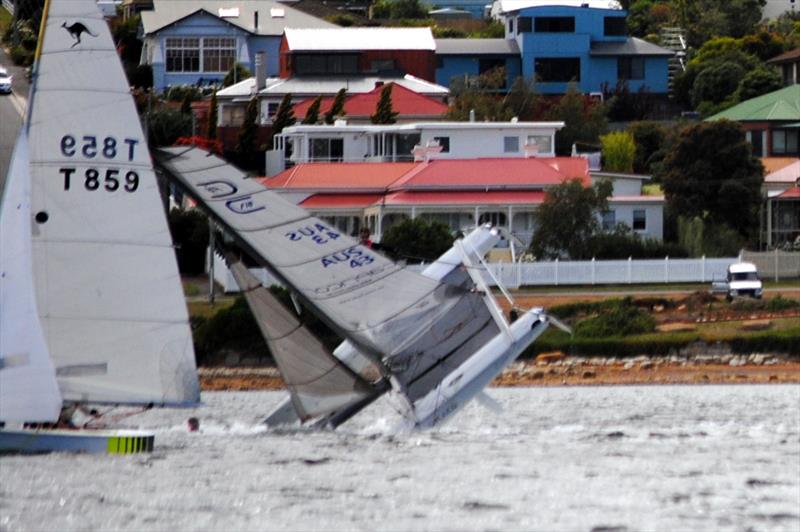 The F18 catamaran Wicked takes a nose-dive at the windward mark on the final day of the Crown Series Bellerive Regatta photo copyright Peter Campbell taken at Bellerive Yacht Club and featuring the Formula 18 class