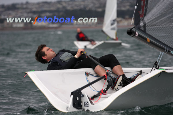 Heather Davies’ shot of an RS300 sailor trying very hard indeed is holding the top spot in the fotoboat calendar competition photo copyright Heather Davies / www.fotoboat.com taken at  and featuring the Fotoboat class