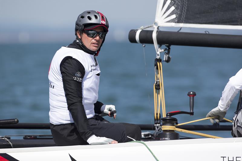 Ernesto Bertarelli at the helm of Alinghi on day 2 of GC32 Cowes Cup photo copyright Sander van der Borch / Bullitt GC32 Racing Tou taken at  and featuring the GC32 class