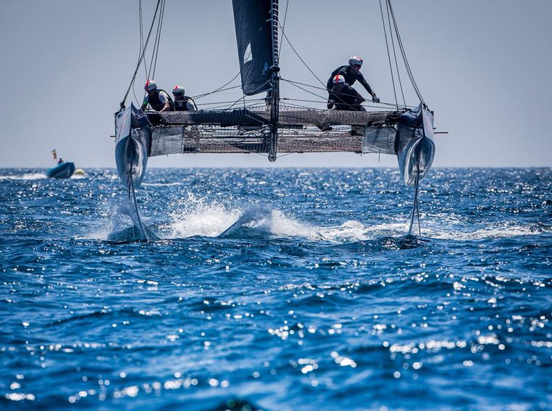 Mamma Aiuto! comes out of the sun on day 3 in the GC32 Racing Tour at the 36th Copa del Rey MAPFRE photo copyright Jesus Renedo / GC32 Racing Tour taken at  and featuring the GC32 class