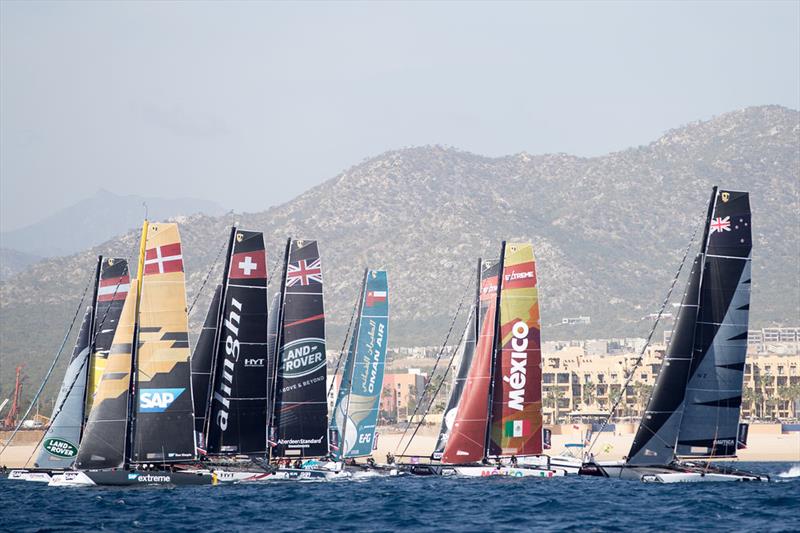 The eight-strong fleet of GC32 catamarans line up for a start during a race on the opening day in Los Cabos. - photo © Lloyd Images