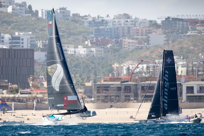 The Extreme Sailing Series 2017. Act 8. 30th November- 3rd December 2017. Los Cabos Mexico, Cabo San Lucas Resort. The 'Oman Air' race team shown in action close to the shore, skippered by Phill Robertson (NZL) with team mates Pete Greenhalgh (GBR) photo copyright Lloyd Images taken at  and featuring the GC32 class