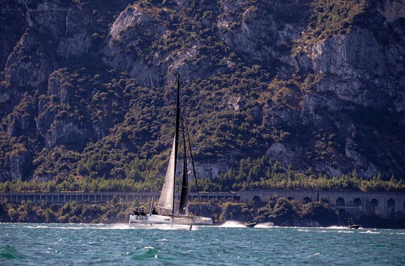 Racing next to Lake Garda's famous Quantum of Solace car chase road photo copyright Sailing Energy / GC32 Racing Tour taken at  and featuring the GC32 class