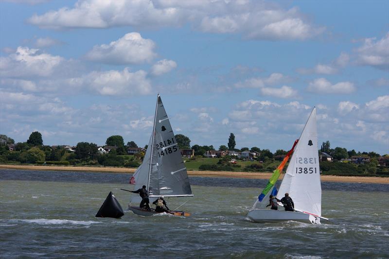 Local sailor John Ball passes the Youth boat on the gybe during the GP14 Southern Areas at Brightlingsea photo copyright David Charlton taken at Brightlingsea Sailing Club and featuring the GP14 class