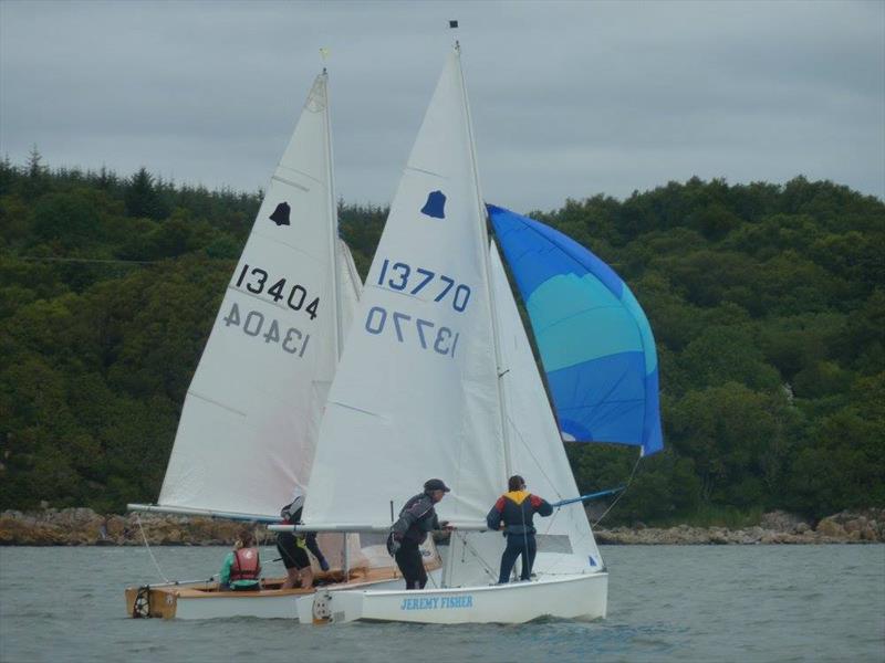 GP14 'Jeremy Fisher' crew Beatrice Overend sets the spinnaker,  just ahead of Shona and Alasdair MacDonald during Solway YC Kippford Week photo copyright Anne-Marie Williams taken at Solway Yacht Club and featuring the GP14 class