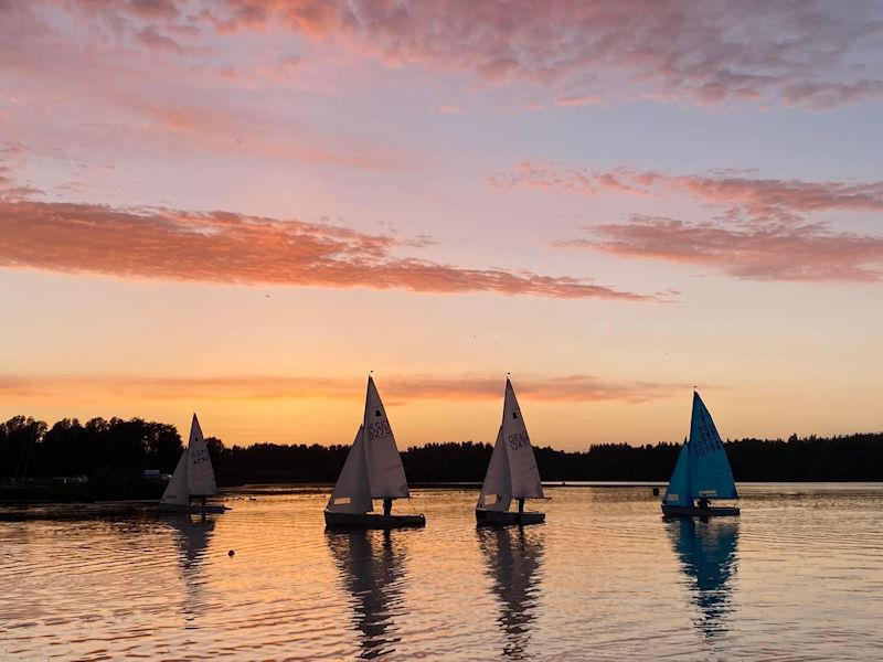 Sunset in the Leigh & Lowton Sailing Club S2S Dinghy Race photo copyright Rebecca Fleet taken at Leigh & Lowton Sailing Club and featuring the GP14 class