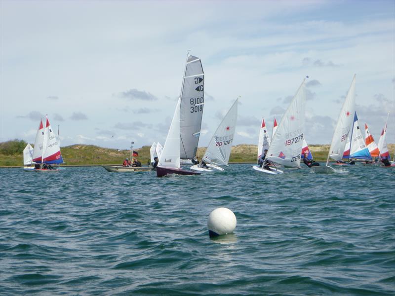First start of the youth fleet at the Lloyd Hayes Open Meeting photo copyright Mike Dorr taken at West Lancashire Yacht Club and featuring the Graduate class