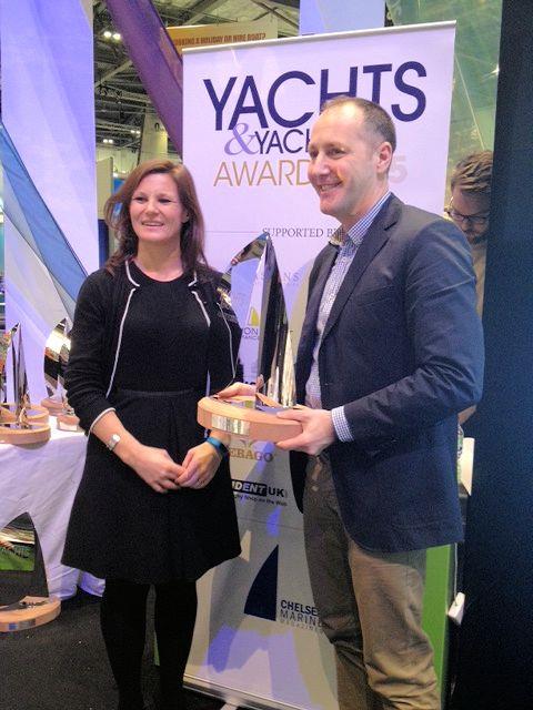 Henri Lloyd's Graham Allen receives the Yachts & Yachting Kit Innovation of the Year Award from editor Georgie Corlett-Pitt photo copyright Henri Lloyd taken at  and featuring the  class