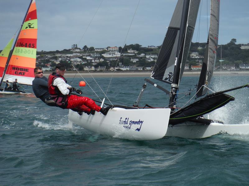 Jimmy Fullerton and Perry Stone in their Hobie Tiger during the Rubicon (Jersey) Channel Islands Hobie Cat Championships photo copyright Bill Harris taken at Royal Channel Islands Yacht Club and featuring the Hobie 18 class