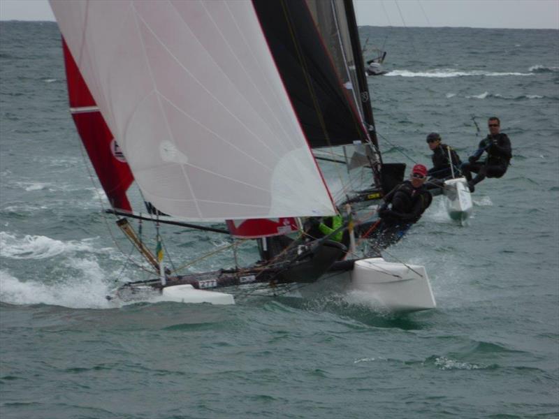 Wildcats dicing downwind on Sunday during the Rubicon (Jersey) Channel Islands Hobie Cat Championships photo copyright Elaine Burgis taken at Royal Channel Islands Yacht Club and featuring the Hobie Wild Cat class