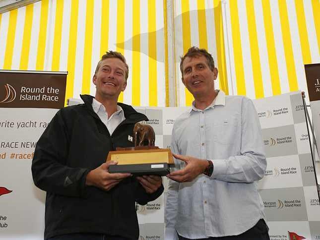 Luke Yeates is presented with the Elephant Boat Yard trophy by Brian Thompson photo copyright Hyde Sails taken at  and featuring the  class