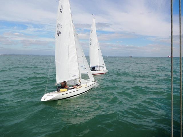 Raymond Simonds chasing brother Colin in Sunday's Illusion racing photo copyright Mike Samuelson taken at Bembridge Sailing Club and featuring the Illusion class
