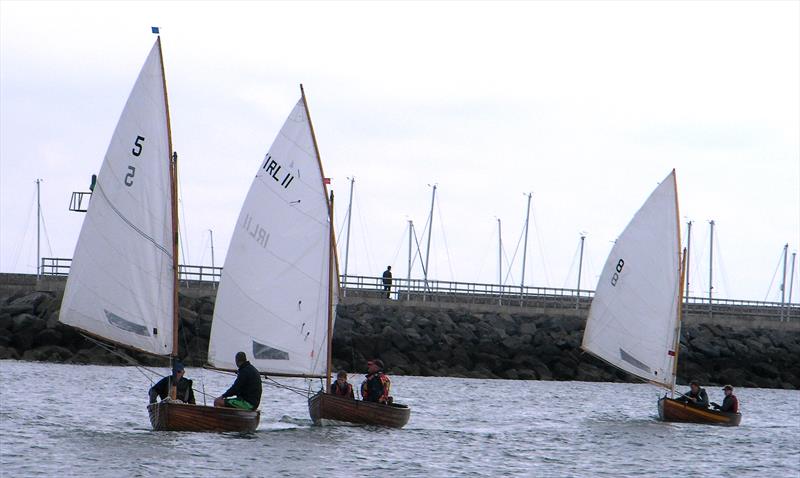 Dorado (No.5) steered by Mark Delany, Pixie (No.11) steered by George Miller and Cora (No.8) Steered by Margaret Delany during the International 12 foot Irish championship of 2016 in Dun Laoghaire Harbour - photo © Vincent Delany