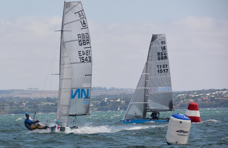 Britain's Glen Truswell leads close rival Ben McGrane around the blustery Corio Bay course on day 3 of the International 14 Worlds in Geelong photo copyright Rhenny Cunningham / Sailing Shots taken at Royal Geelong Yacht Club and featuring the International 14 class