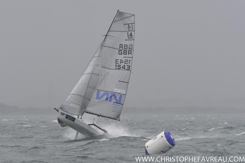 Wild conditions on day 5 of the International 14 Worlds in Geelong photo copyright Christophe Favreau / www.christophefavreau.com taken at Royal Geelong Yacht Club and featuring the International 14 class