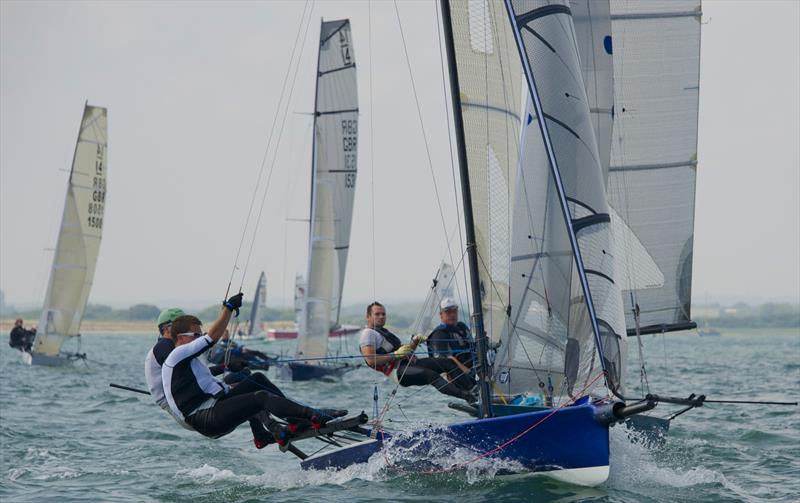 Ed Clay and David Knight leading the pack during the International 14 Walker Trophy at Itchenor Sailing Club photo copyright Mary Pudney taken at Itchenor Sailing Club and featuring the International 14 class
