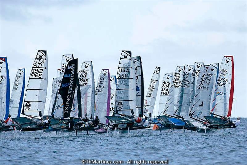 A lack of wind on Kaneohe Bay for day 1 of the 2013 McDougall   Maconaghy Moth Worlds photo copyright ThMartinez / Sea&Co / Moth World Championship taken at  and featuring the International Moth class