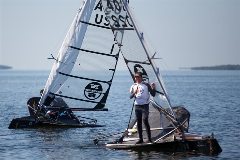 Sailors, supporters, fans, and volunteers find other activities to occupy a hot, windless day at the US International Moth Championships in Key Largo photo copyright Meredith Block / US Moth Class taken at Upper Keys Sailing Club and featuring the International Moth class