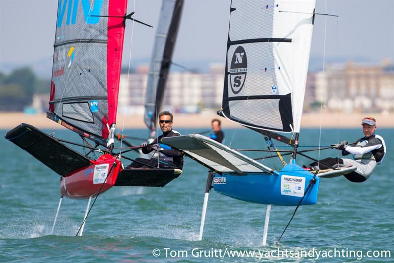Mike Lennon on Tom Offer's tail on day 5 of the International Moth World Championships photo copyright Tom Gruitt / YachtsandYachting.com taken at Hayling Island Sailing Club and featuring the International Moth class