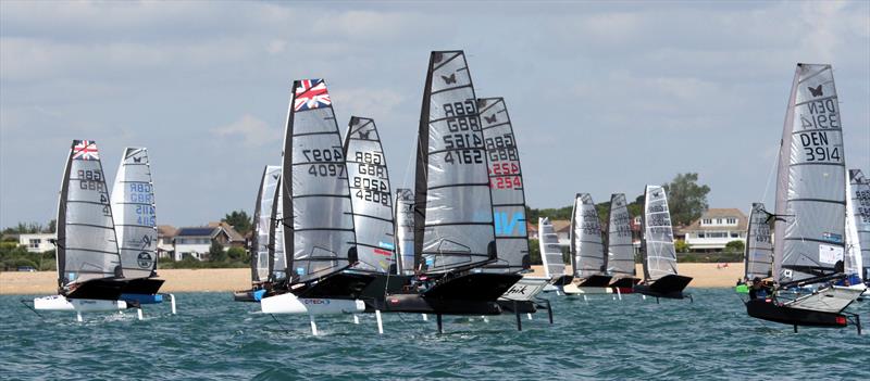 The fleet on day 3 of the International Moth UK Nationals at Stokes Bay photo copyright Mark Jardine taken at Stokes Bay Sailing Club and featuring the International Moth class