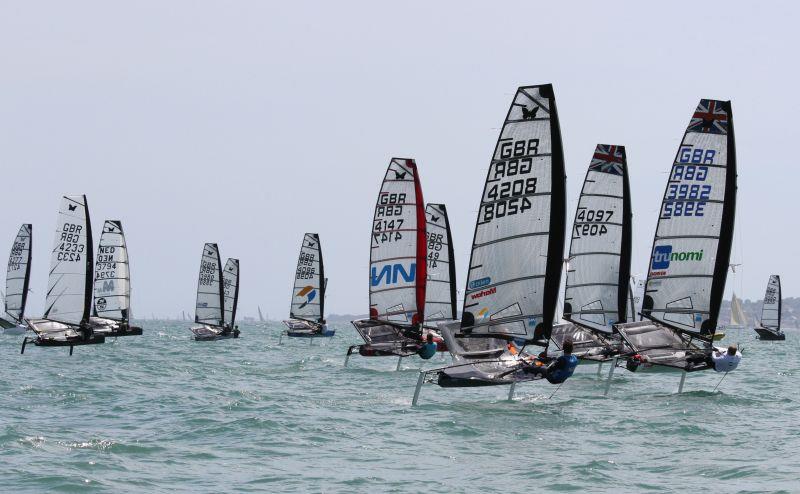 Powering upwind on day 3 of the International Moth UK Nationals at Stokes Bay photo copyright Mark Jardine taken at Stokes Bay Sailing Club and featuring the International Moth class