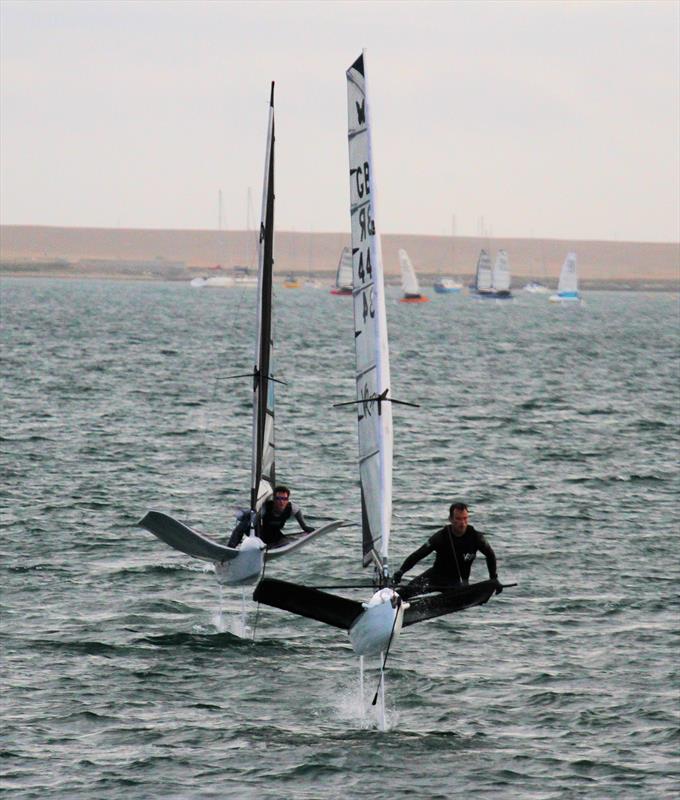 Dylan Fletcher and David Hivey mid gybe on day 2 of the VRsport.tv International Moth UK Nationals in Weymouth photo copyright Mark Jardine / IMCA UK taken at Weymouth & Portland Sailing Academy and featuring the International Moth class
