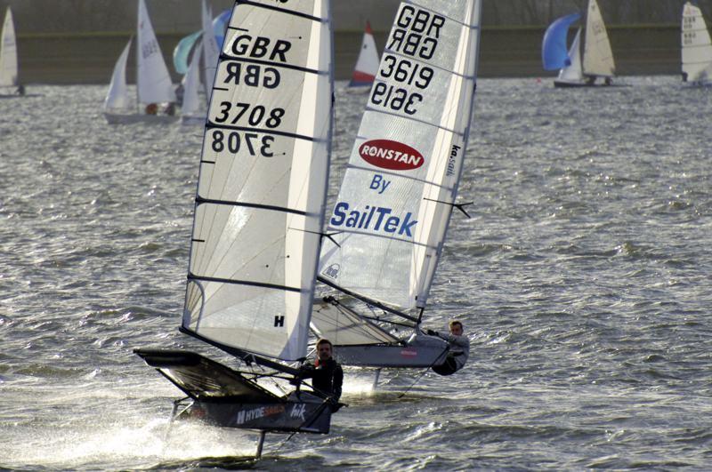 Jason Belben (right) and Mike Lennon battle it out as foiling moths dominate the 39th Bloody Mary photo copyright Steve Arkley / www.surf2turf.com taken at Queen Mary Sailing Club and featuring the International Moth class