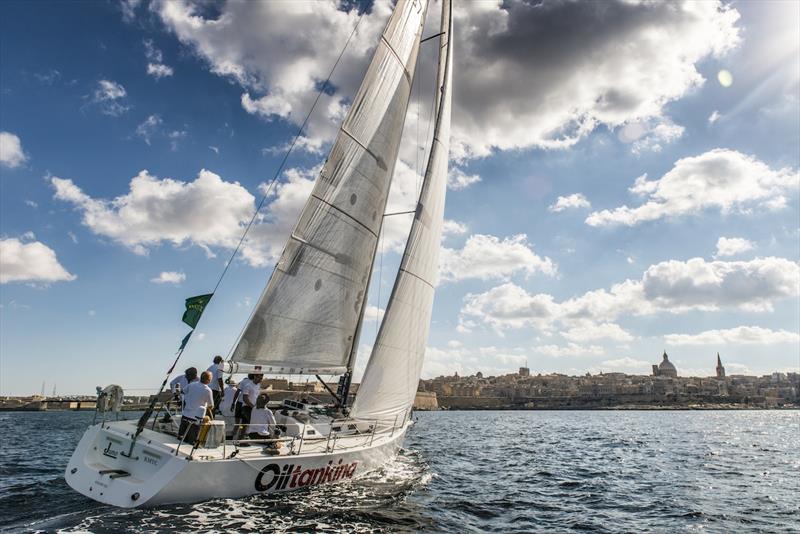 Oiltanking Juno crossing the finish line at Marsamxett Harbour in the Rolex Middle Sea Race photo copyright Kurt Arrigo / Rolex taken at Royal Malta Yacht Club and featuring the IRC class