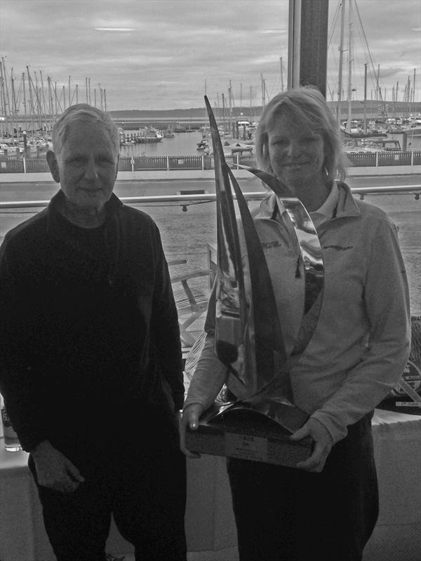 of Hannah Neve receiving the Trophy for the INEOS Solent Circuit IRC Class 1 Trophy from LTSC Commodore Nick Ingram photo copyright Nick Hopwood taken at Lymington Town Sailing Club and featuring the IRC class