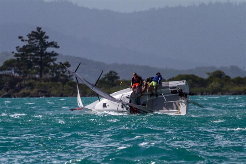 Cruising Division 3's Slingshot almost on their ear on the way out of the bay on day 5 of Vision Surveys Airlie Beach Race Week photo copyright Shirley Wodson taken at Whitsunday Sailing Club and featuring the IRC class